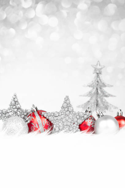 istock Colorful christmas decoration on snow close-up 869635030