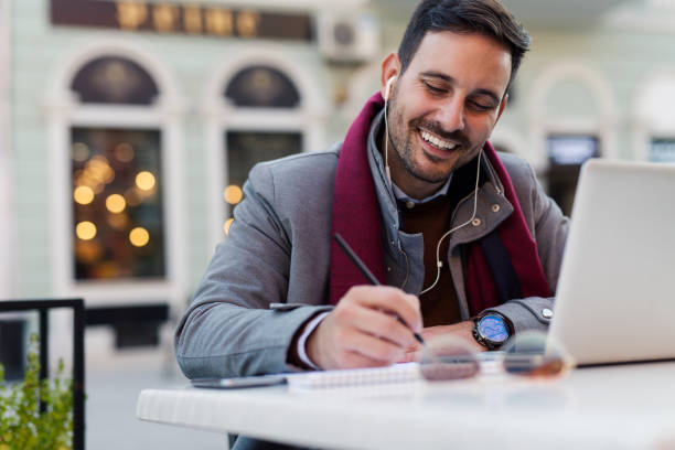istock Man at coffee shop 869635036