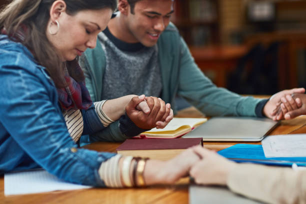 istock Hoping and praying for the best in their studies 869637880