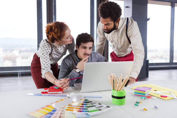 istock Business people in modern office working on project. 869637996