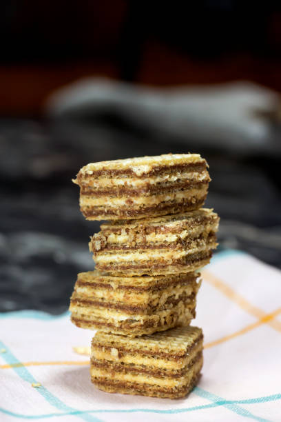 istock mini crispy wafer with chocolate on pink tile napkin 869638218