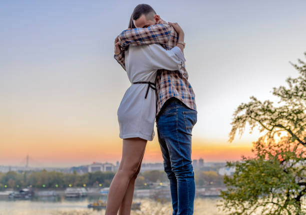 istock Romance couple in the park 869648156