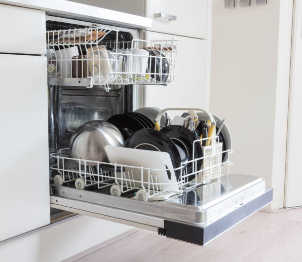 istock Open dishwasher with clean plates, cups and dishes 869654186
