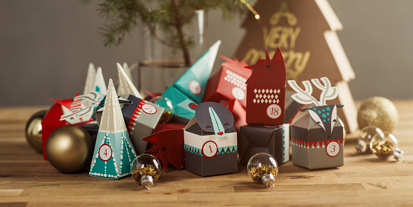 Festive Christmas calendar. Holiday gift bags. Holiday concept.