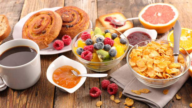 istock healthy breakfast with coffe,cereal and fruit 869655724