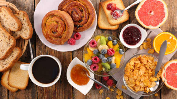 istock healthy breakfast with coffe,cereal and fruit 869655742