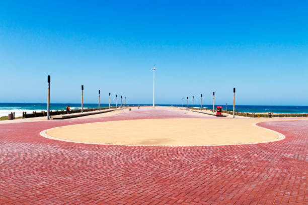 istock Paved Promenade Pattern and Texture Against Sea and Sky 869658176