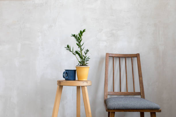 istock Interior shot of chair and decorative table 869658334