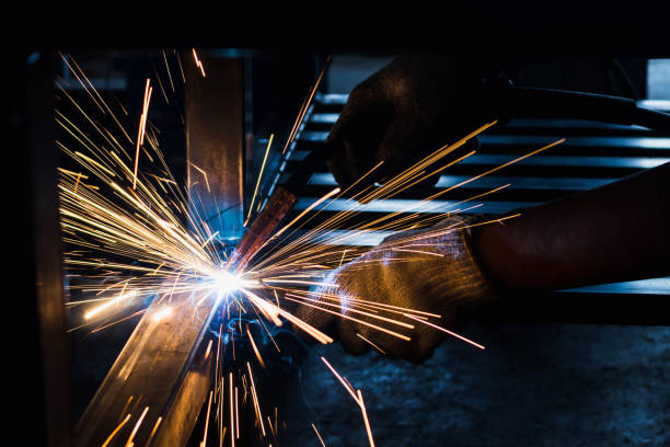istock Wolker welding metal work blue arc with copy space 869665662