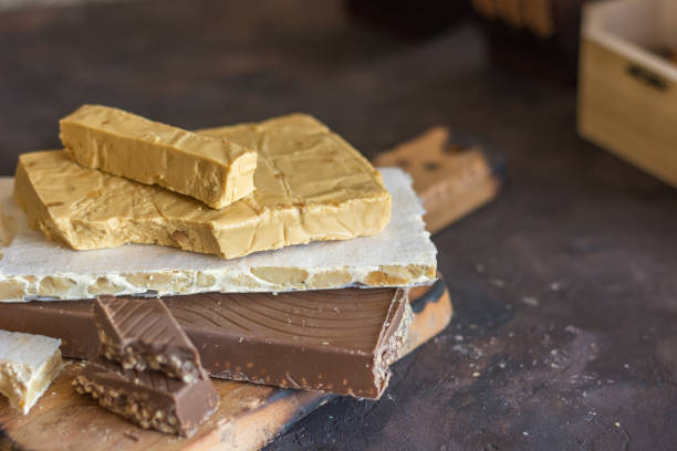 Various types of turrons,nougat, chocolate, nuts and soft nougat. stock photo