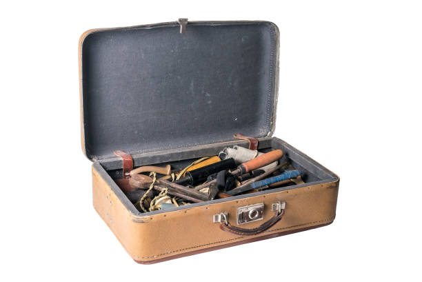 istock Image of open retro suitcase full of old working tools isolated 869678282