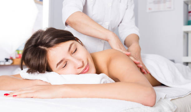 istock Young woman having massage 869678766
