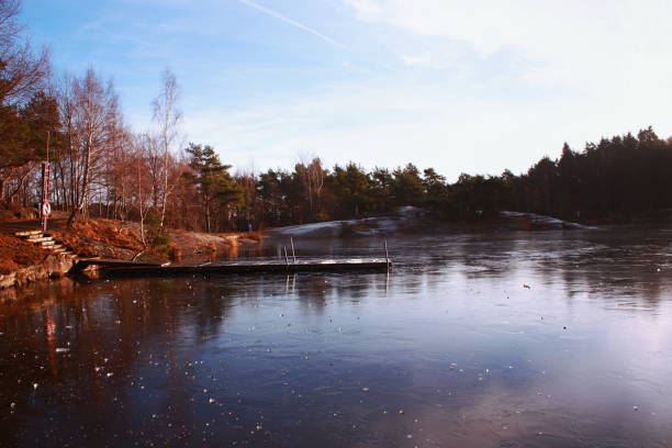 Frozen november lake stock photo