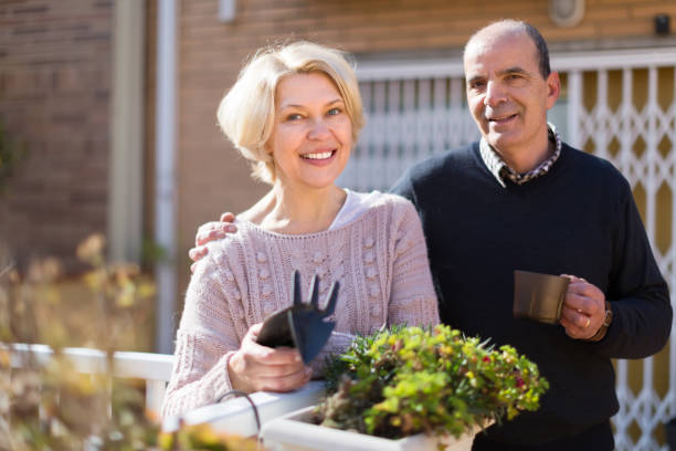 istock Elderly spouses in patio 869683644