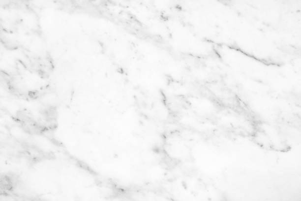 istock White Carrara Marble natural light surface for bathroom or kitchen countertop 869687330