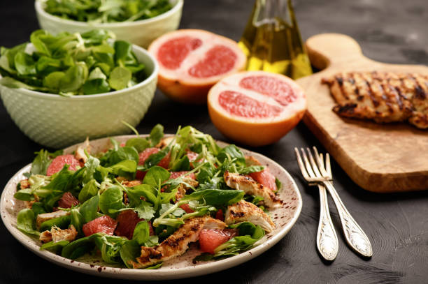 Grilled chicken and grapefruit salad. stock photo