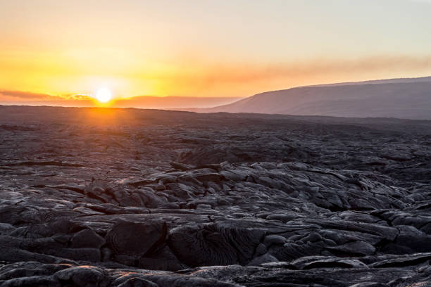 istock Sunset over a frozen volcanic lava field 869698342