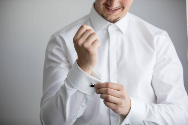 istock Young handsome groom preparing for wedding 869698414