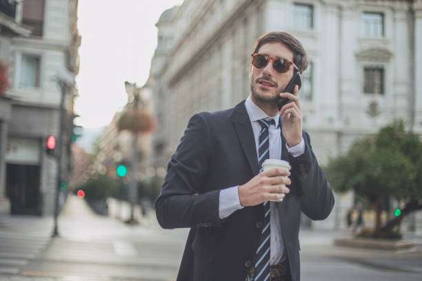 istock Drinking coffee on the street 869701614