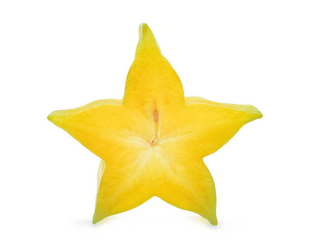 half cut of star apple tropical fruit isolated on white background