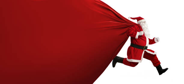 istock Santa Claus with a huge bag on the run 869717872