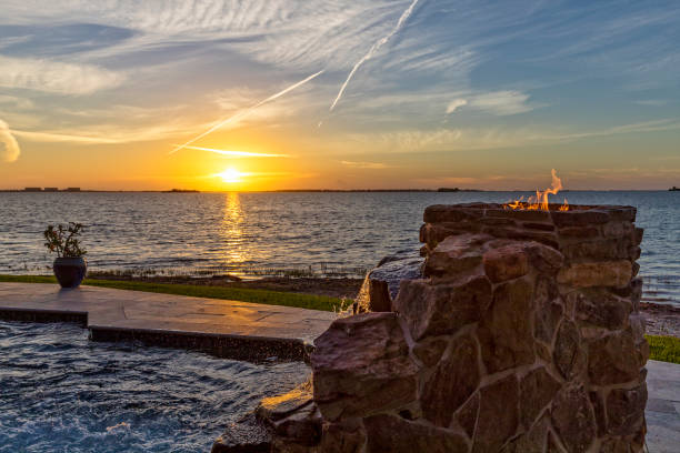istock Fire and waterfall feature of a swimming pool overlooking Tampa Bay 869719452