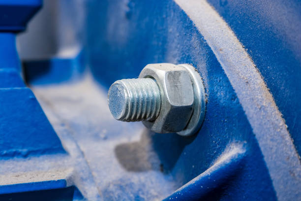 istock Close up metal nut on bolt 869719516