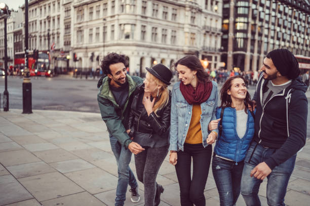 Friends hanging out in UK Group of friends enjoying London together london girl stock pictures, royalty-free photos & images