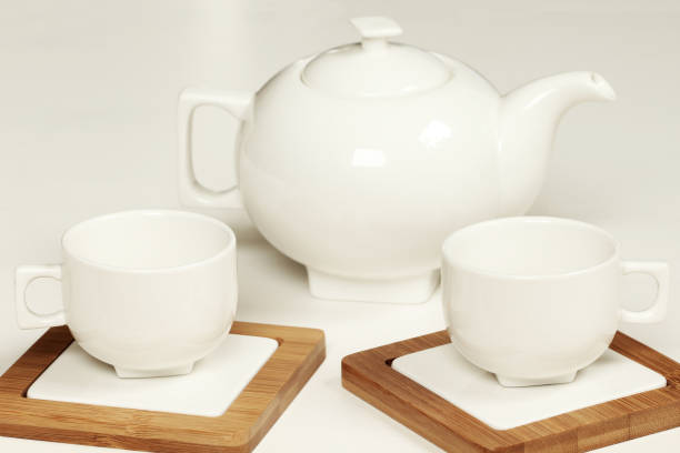 istock White cup and teapot fot tea or coffee 869730306