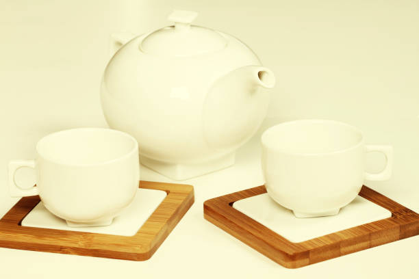 istock White cup and teapot fot tea or coffee 869730362