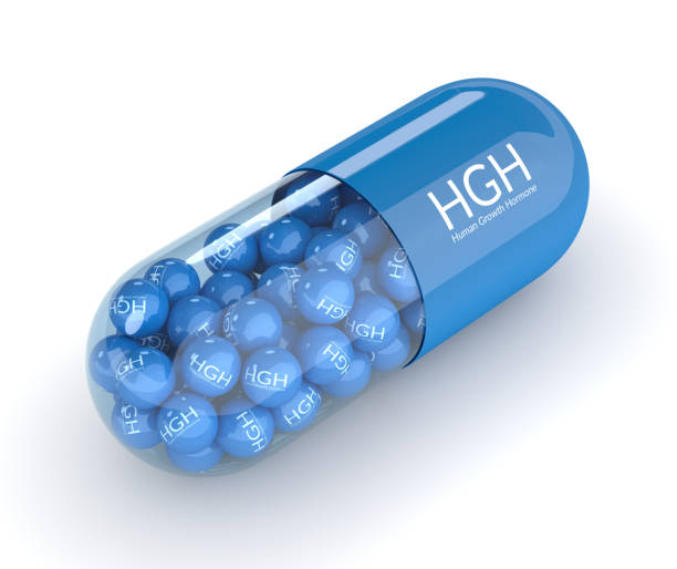 istock 3d render of  HGH pill with granules over white 869730444
