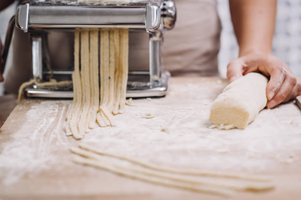 istock Making of italian Tagliatelle pasta 869737798