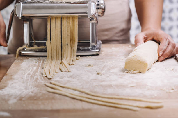 istock Making of italian Tagliatelle pasta 869737810