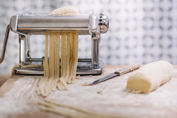 istock Making of italian Tagliatelle pasta 869737836