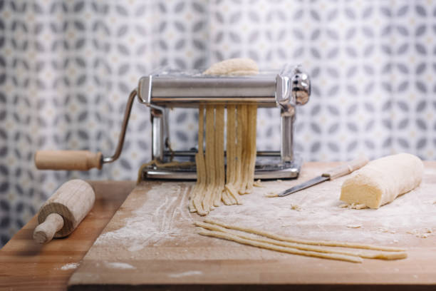 istock Making of italian Tagliatelle pasta 869737842