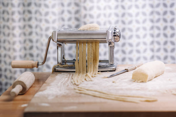 istock Making of italian Tagliatelle pasta 869737858