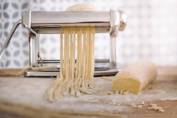 istock Making of italian Tagliatelle pasta 869737938