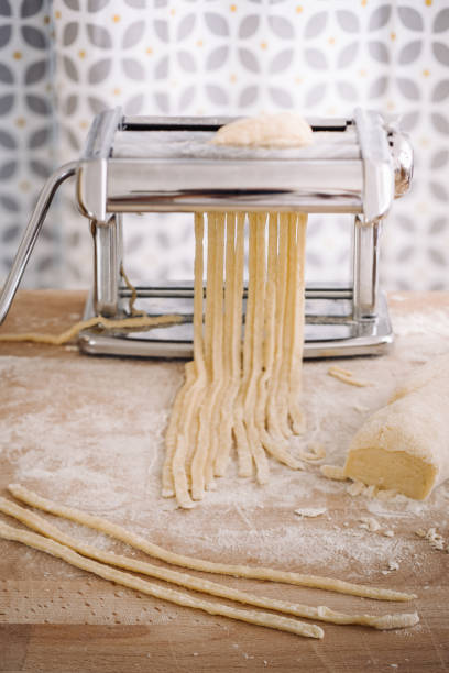 istock Making of italian Tagliatelle pasta 869737940