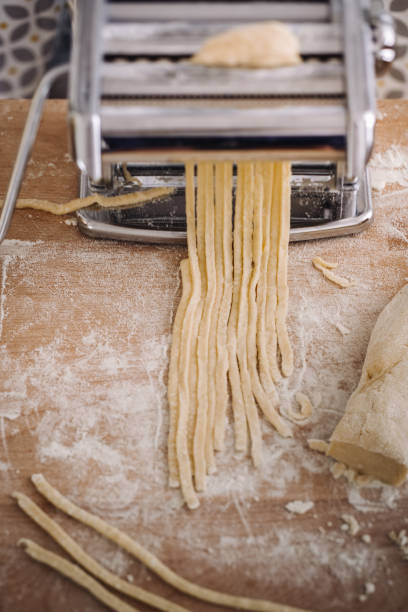 istock Making of italian Tagliatelle pasta 869738048