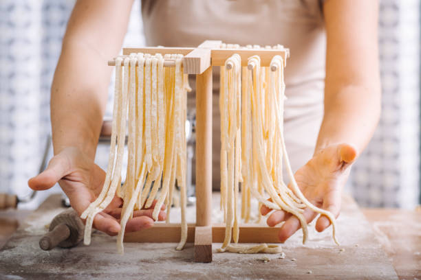 istock Making of italian Tagliatelle pasta 869738106