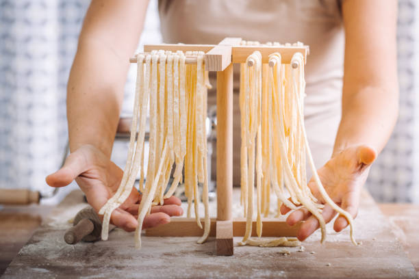 istock Making of italian Tagliatelle pasta 869738124