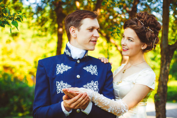 istock Couple in beautiful suits 869749760