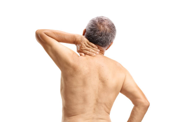 istock Shirtless mature man experiencing neck pain 869756798