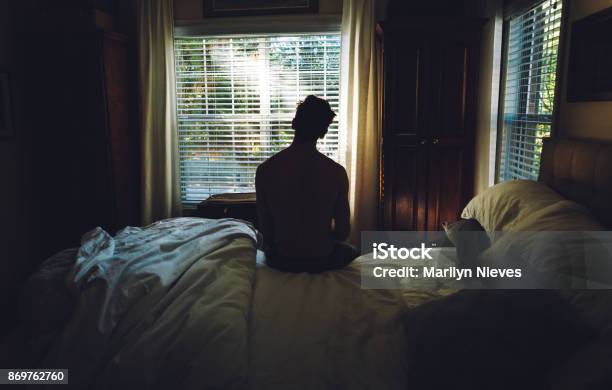 Tired Man Waking Up In The Morning Stock Photo - Download Image Now - Waking up, Men, Bed - Furniture