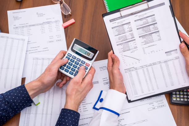 istock Business team working at office. Business people. paperwork 869766294