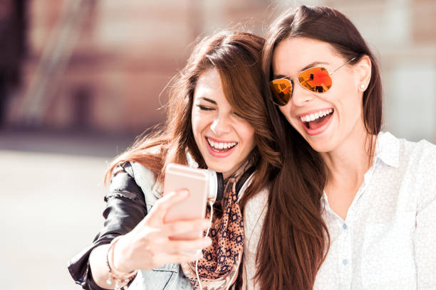 istock Friends having fun outdoors 869766828