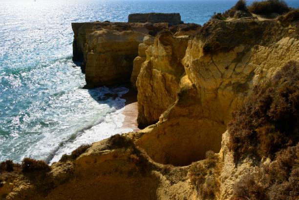 istock Pit Cave (algar), cliffs outside Albufeira, Algarve, Portugal 869771482