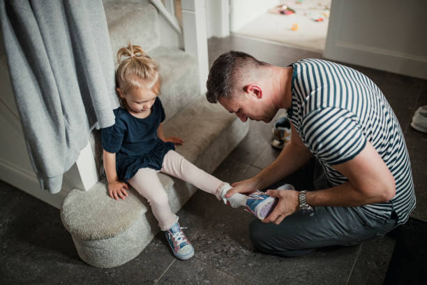 Putting His Daughters Shoes On