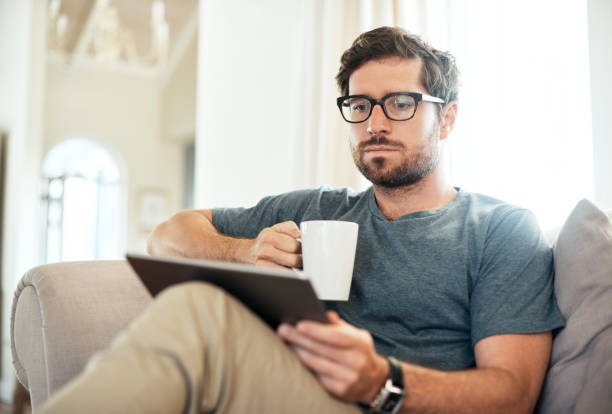 istock Starting his day with coffee and connectivity 869773204