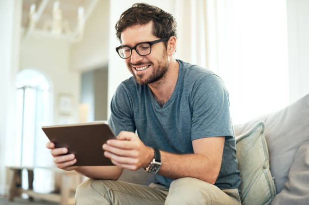 istock Spending some of his free time online 869773206